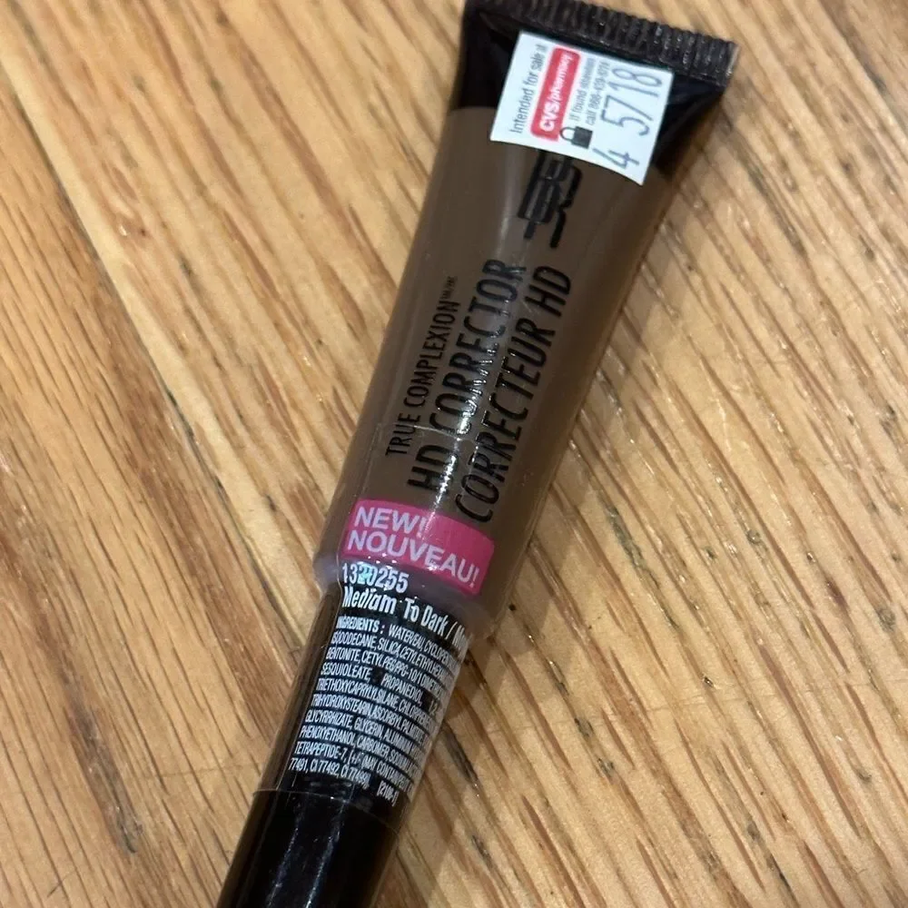 Black radiance color corrector medium to dark neutral